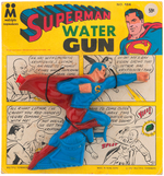 "SUPERMAN WATER GUN" CARDED FIGURAL SQUIRT GUN.