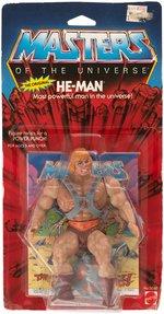 "MASTERS OF THE UNIVERSE HE-MAN" ON 12-BACK CARD.