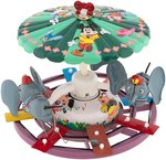 "MECHANICAL DISNEY MUSICAL MERRY-GO-ROUND" BOXED MARX WIND-UP CAROUSEL.