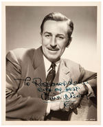 WALT DISNEY SUPERB AUTOGRAPHED PHOTO TO EMPLOYEE AND I. D. CARD.