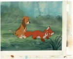 "THE FOX AND THE HOUND" COPPER & TOD PRODUCTION CEL SETUP WITH PRELIMINARY PRODUCTION BACKGROUND.