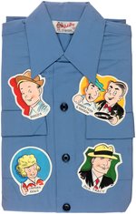 DICK TRACY & LITTLE ORPHAN ANNIE COMIC CHARACTERS ORIGINAL ART PROTOTYPE PATCHES ON SHIRT DISPLAY.