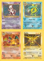 1999 POKÉMON SHADOWLESS HOLOGRAPHIC UNCUT PROOF SHEET WITH 99 CARDS, INCLUDING 7 CHARIZARD CARDS.