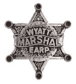 "WYATT EARP MARSHAL" 1957 BADGE.