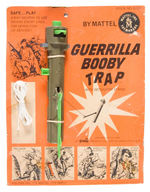 “MATTEL GUERRILLA BOOBY TRAP” CARDED TOY.