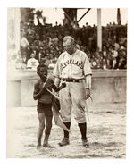 "CLEVELAND INDIANS PRESENTED WITH MASCOT" TRIS SPEAKER WITH AFRICAN AMERICAN BOY NEWS SERVICE PHOTO.