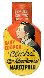 RARE LITHO TIN MOVIE PROMOTION CLICKER PICTURING GARY COOPER.