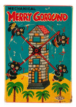 "MECHANICAL MERRY GOROUND" BOXED TIN LITHO WIND-UP WITH PYGMIES BY YONEYA.
