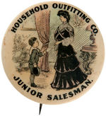 "HOUSEHOLD OUTFITTING CO. JUNIOR SALESMAN" CHARMING BUTTON WITH VICTORIAN PARLOR SCENE.