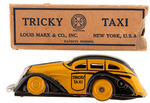 “MARX TRICKY TAXI ON BUSY STREET” BOXED TOY WITH TWO WIND-UP TAXIS.