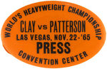 CASSIUS CLAY VS. FLOYD PATTERSON “PRESS” BUTTON FROM THEIR 1965 FIGHT.