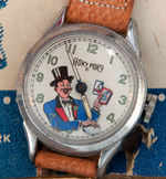 "HOKY POKY" BOXED MAGICIAN ANIMATED WRIST WATCH.