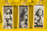 "HOLLYWOOD SCREEN GALS/OH BOY! TAKE YOUR PICK!" PIN-UP KEY CHAIN DISPLAY.