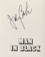JOHNNY CASH AUTOGRAPH & SIGNED "MAN IN BLACK" BOOK.