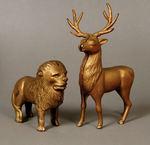 LION AND REINDEER CAST IRON BANKS.