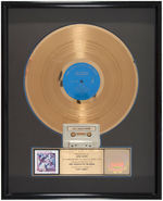 "THE FABULOUS THUNDERBIRDS - TUFF ENUFF" RIAA GOLD RECORD/CASSETTE HOLOGRAM SALES AWARD DISPLAY.