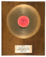 BRUCE SPRINGSTEEN “BORN TO RUN” GOLD RECORD AWARD PRESENTED TO RADIO PROGRAM DIRECTOR.