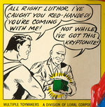 “SUPERMAN WATER GUN” ON DIE-CUT DISPLAY CARD.