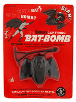 "BATMAN'S CAP-FIRING BAT-BOMB" CARDED TOY.