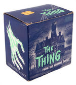 "THE THING FROM THE ADDAMS FAMILY" BOXED BATTERY-OPERATED BANK.