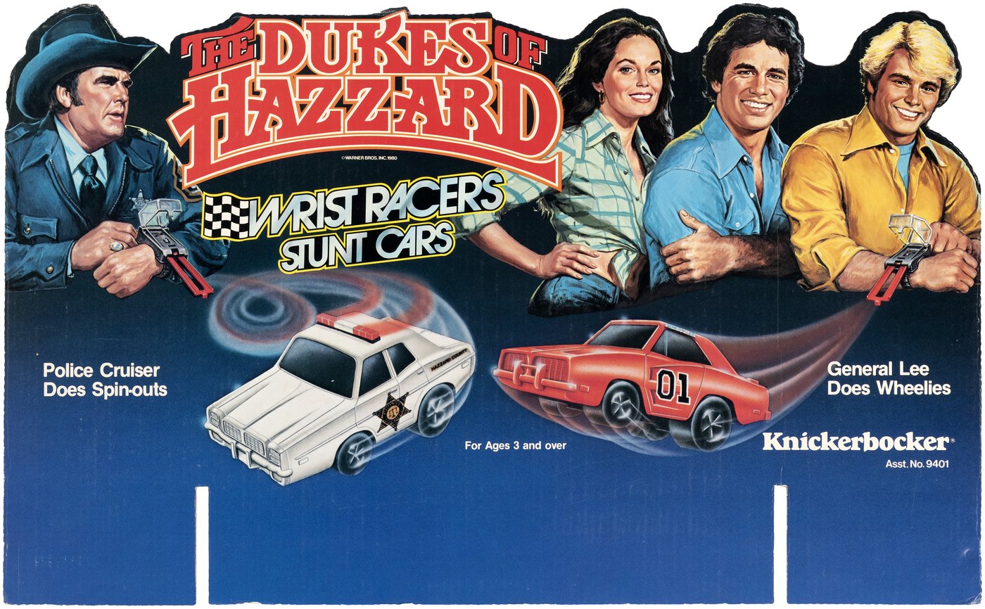 Hake's - THE DUKES OF HAZZARD WRIST RACERS STUNT CAR DISPLAY HEADER CARD.