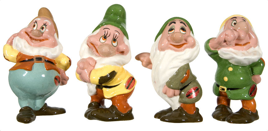 Hake's - SNOW WHITE AND THE SEVEN DWARFS AMERICAN POTTERY FIGURINE SET.